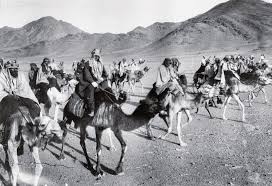Bedouin raiders - Lawrence on the dark camel